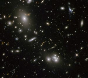 Large sample galaxies of different sizes and shapes, experiencing a lens-like distortion.